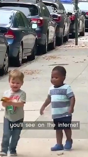 Two Toddlers Adorably Hug Each Other While Running on Street