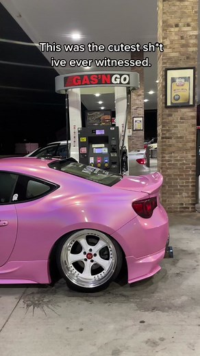 People Hugging a Car