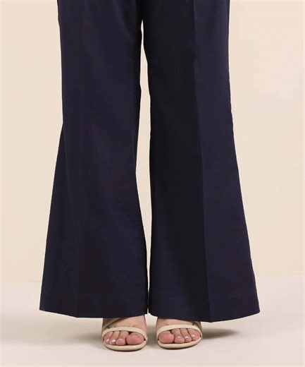 Dhanak Boutique on Instagram: "Step into style with our fabulous Bell Bottom Trousers! ✨👖 Crafted from soft cotton, these trousers not only provide comfort but also elevate your wardrobe with their chic silhouette. Perfect for both casual outings and workdays, they seamlessly blend ease and elegance, making you feel confident and radiant wherever you go! 🌟💁‍♀️ Available for just Rs1000.00, it’s a steal for standout style! Unleash your inner fashionista today! 💃❤️ #FashionTrends #BellBottoms