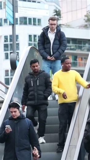 Touching peoples hand on the escalator #shorts