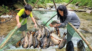 18K views · 211 reactions | Orphans Make fish traps under the waterfall, Harvest big carp to sell Fish trapping techniques | CR-Truck Action-cv | Facebook