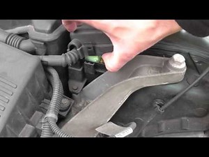 Where is the engine compartment fuse box located in the Mini Cooper?