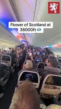 Tartan Army belt out Flower of Scotland as they take over American Airlines flight at 38,000 feet