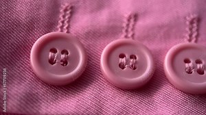 Pink Buttons On Pink Fabric