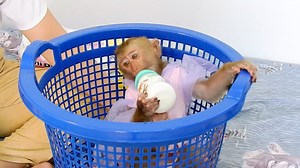 Jessi Look Very Comfortable With Bottle Milk In Basket. | Kingdom Of Monkeys