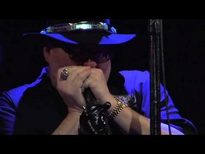 John Popper of Blues Traveler plays the National Anthem on his Harmonica