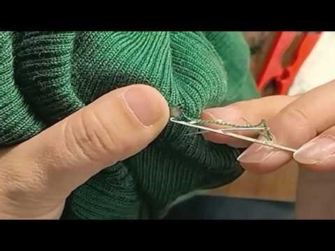 Master class on mending holes in a sweater by hand with a needle