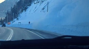 See the moment an avalanche partially buries vehicle on Quebec highway