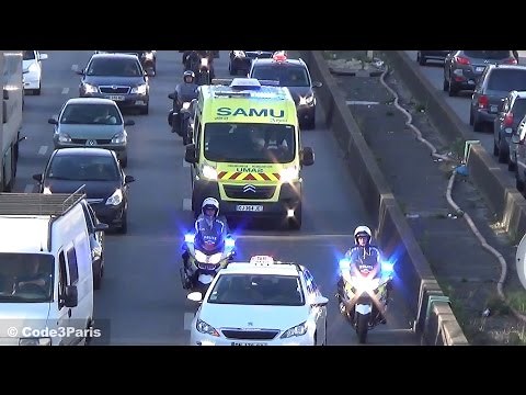 Police Motorcycles Escort Ambulance Through Heavy Traffic