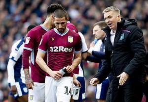 Dean Smith admits it's the job of the Aston Villa players to get the fans 'behind' the team