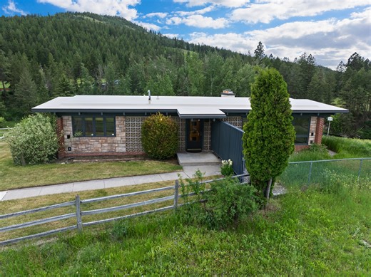 🏔️ MONTANA HORSE PROPERTY 66 ACRES 🏔️ Welcome to the T Bar A Ranch, one of Kalispell, Montana's most prominent and historic properties. Boasting 66 /- acres of irrigated pasture lands, mature timber, a half mile of Ashley Creek frontage, and only a few miles from downtown Kalispell, this truly is one of the finest estates in Montana's famed Flathead Valley. Perfectly positioned overlooking both Ashley Creek and the surrounding ranges of mountains sits an impeccably maintained, recently updated