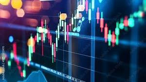 Financial Chart Analysis on Monitor Showing Upward Trend