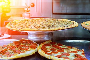 Family of Pizza Shop Owners Sentenced in Tax Fraud Case After Skimming Cash from Business