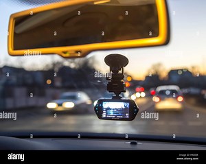 Dashcam in a passenger car, video camera on the windshield, permanently records the traffic in front of the vehicle, to the accident documentation Stock Photo - Alamy