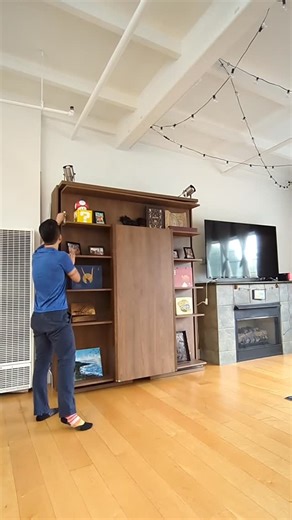 Expand Furniture on Instagram: "Compatto Wall Bed Revolving Bookcase Table by @expandfurniture 👇Comment below if you have questions or checkout this product on our website (link in bio)!"