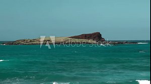 Kāohikaipu (also known as Black Rock) is an islet located in Honolulu County, Hawaii. Makapuu Beach Park, Oahu, Hawaii.