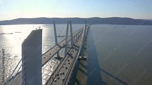 Hudson river Bridge in New York, People traveling during sunset. Arial Drone View 4K