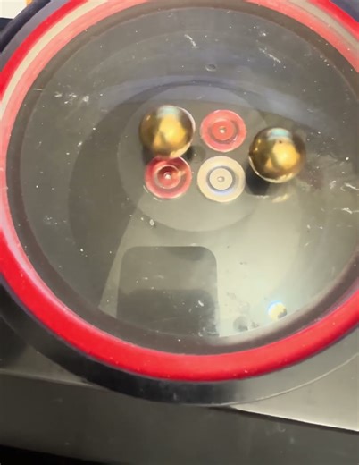 2 brass balls, non-magnetic, so how do these brass balls spin? ￼