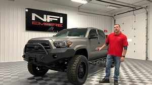 Dean walks your around the Limited 2018 Toyota Tacoma Limited! Get ready to turn heads and give your neighbors whiplash with this truck! The first thing you will notice is the size of the truck and the satin gun metal wrap. The Tacoma sits on a 4 inch BDS Suspension lift with Fox Shocks in the rear, Adjustable front reservoir coilovers, 20 inch Rolling Big Power wheels wrapped in 35 inch tires. The Fab Fours rear bumper and aftermarket front bumper give this truck an aggressive look. Light up th