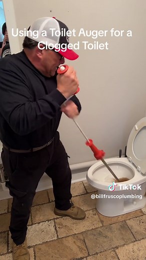 Using a toilet auger for a clogged toilet 🚽 #plumbing #plumber #plumbinglife #plumbersoftiktok #plumberlife #toilet #toiletclean #toiletpaper #clog #draincleaning #drain #auger #bluecollar #fypage