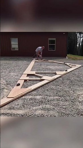 Gluing and nailing truss plywood gussets #shorts #trusses #diy #garagebuild #construction