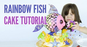 36K views · 92 reactions | Rainbow  fish  cake  The next cake In the beanie boo series is live! This week we’re diving into more cake structure and learning how to create cakes that appear to be floating  Full post with materials list: https://sugargeekshow.com/news/rainbow-fish-cake-tutorial/ Pin it and make it later: https://www.pinterest.com/pin/66780006960520555/ | Sugar Geek Show | Facebook