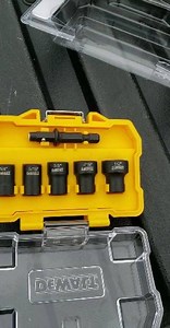 New DeWalt Impact Ready Detachable magnetic nut driver set. This is a clean and simple set that looks to be well made/machined. The magnetic driver fits tightly into the nut socket with a snap. There is near zero play. Model: DWADND-5 Lowe's item: 1072064 Price: $14.95 Available: Now Features: Detachable nut driver design allows users to clean off debris, enhancing the overall life Magnet provides fastener retention for ease of use Universal shank accepts detachable nut driver sizes from 1/4-in 