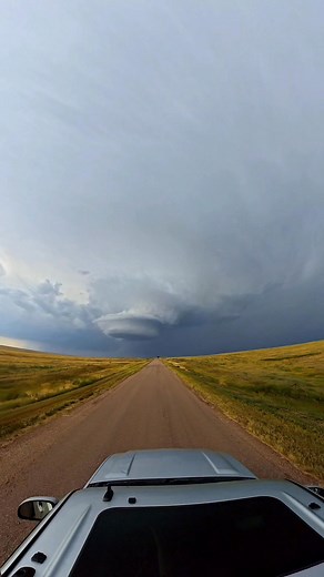 Driving up to a supercell is always a majestic scene.. 8-9-25 Karval, CO #chasing #weather #stunningviews #Colorado #cowx #supercell #storm #SevereWeather #stormchaser #tornadowarned | Storm Chaser Ben McHone