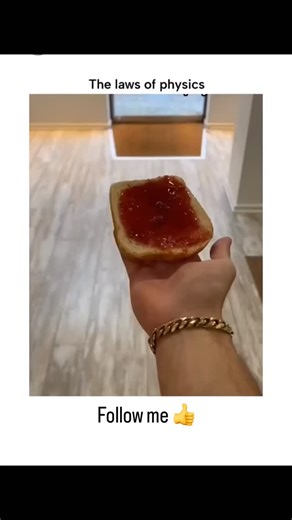 im_adnan on Instagram: "Dm for Credit / Removal This @HumansNoContext video captures the “buttered toast phenomenon,” where dropped toast rotates mid-air to land jam-side down due to gravitational torque acting on its off-center mass. The clip’s twist—taping jam-toast to a sneaker sole and dropping it—yields a “success” with jam facing up upon landing, satirizing futile hacks against everyday physics fails. Peer-reviewed models, like a 2002 arXiv paper, confirm the effect from table heights (0.7