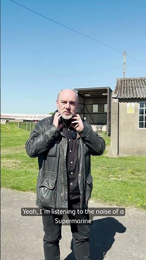 Aircraft expert listens to the sound of Supermarine Spitfire engine