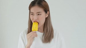 Asian woman feel sensitive teeth after eating ice cream, female suffer tooth, decay problems, dental care, tooth extraction, decay problem, bad breath, Gingival Recession, Oral Hygiene instruction