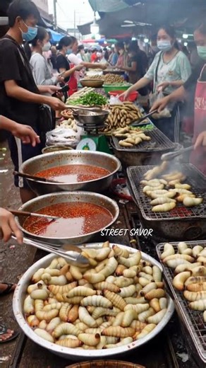 Crowded Market Chaos: Giant Larvae Street Food Craze in Southeast Asia@muhinsavor-ai