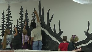 Artist returns to her roots; Paints mural at Buchanan Middle School