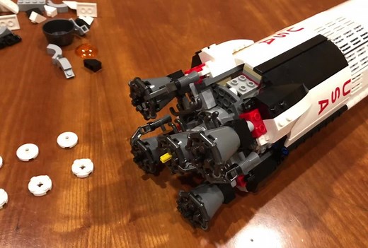 Watch the LEGO Saturn V rocket with 1969 pieces build itself! | Beyond the Brick