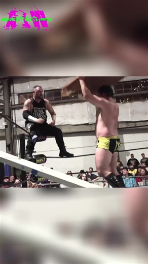 Brutal. Door-assisted Muscle Buster?! This match is INSANE.