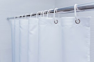 How To Clean A Shower Curtain Liner—And Keep It From Getting Gross Again
