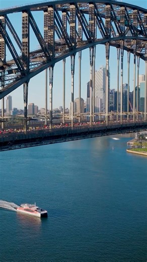 Sydney Marathon was an event to remember 👏 History was made this past weekend at TCS Sydney Marathon debut as an official @wmmajorsevent, with new records set amid an electric atmosphere that took over Warrane's (Sydney.com’s) iconic harbour 🎉 Shall we start training for next year? 🏃 | 🎥: IG/sydney_marathon | 📍: Warrane (Sydney), Visit NSW | #SeeAustralia #ComeAndSayGday #FeelNSW #FeelNewSydney | ID: Text over video reads "Welcome to the 7th World Marathon Major in Sydney" as a series of vi