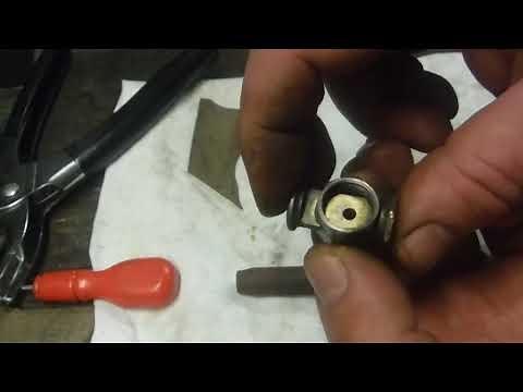 Fuel tap repair, classic motorcycle push on, push off type - making & fitting new cork washers.
