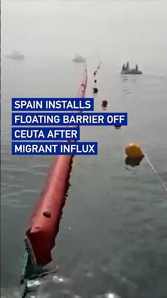 Spain installs floating barrier off Ceuta after migrant influx #worldnow