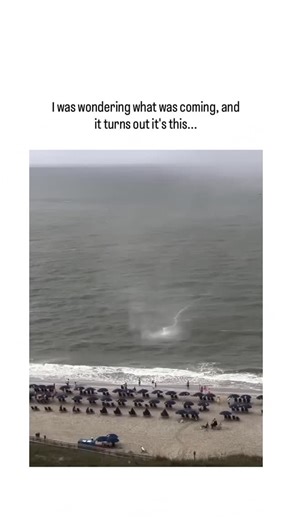 Sarcastic.meme on Instagram: "- The post from Japanese paranormal account shares a 26-second video of a waterspout forming over the ocean and briefly approaching a crowded North Myrtle Beach, captioned to build mystery around an “approaching” unknown. - Originally filmed by Jim Wolfe in August 2025, the event shows a short-lived waterspout— a rotating air column over water— that dissipates without reaching shore, a routine coastal weather phenomenon fueled by temperature differences and wind she