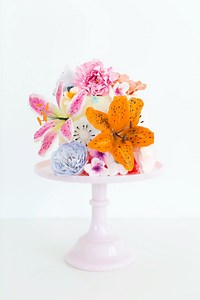 The flowers from this DIY Sugar Flower Cake are totally made out of sugar which means they're both gorgeous and delicious! Although really, they're almost too pretty to eat! I'm not going to be the one to tell you that you can't use them for both Mother's Day and Easter! ;) https://sugarand.cl/29dyFTY | Sugar & Cloth | Facebook