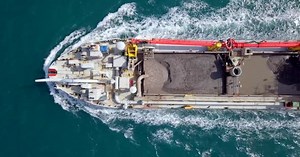 Aerial footage of a Trailing suction hopper dredger at sea