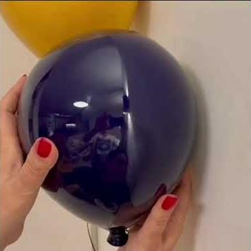 Ceramic Balloon sculpture installation - Yellow and Aubergine duo