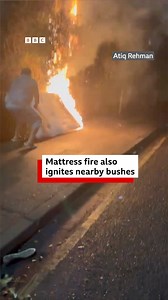 Eyewitness Atiq Rehman described a mattress fire as “horrible,” following the blaze on Eastfield Road in Peterborough on Monday, where the flames also spread to nearby bushes. The blaze is believed to have been started deliberately and an investigation is now under way, emergency services said. | BBC Cambridgeshire