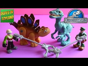 Jurassic World dinosaur toys Playskool Heroes 2015 Velociraptor & Stegosaurus dino tracker Hasbro
