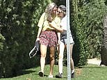 Kristen kisses screenwriter Dylan Meyer while on a stroll