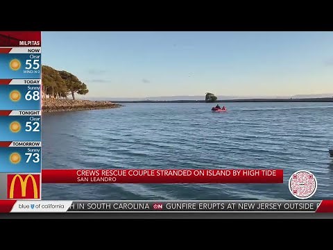 Couple stranded on island by high ride rescued
