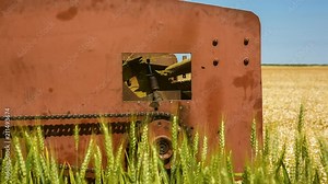 The old reaping machine was prepared and repaired for harvesting wheat