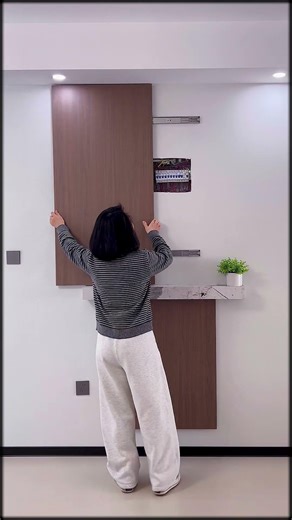 3 Genius Ways to Hide an Electrical Panel - Marble Sliding Wall Cover #homedecor #interiordesign