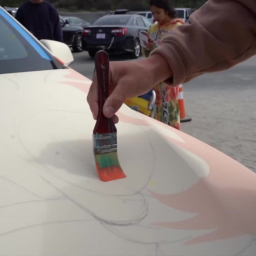 Customizing my Tesla in Public 👀 #reels #tesla #costomized #paint #design #viral | MARKO